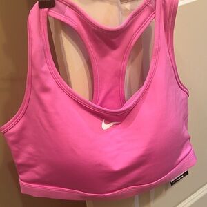 Nike Vibrant pink NWT athletic bra XL with medium support cups. Padded bra cups